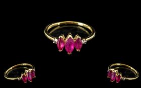 Ruby Marquise Trio and Diamond Ring, three marquise cut rubies, the centre stone larger than the