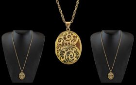 Ladies - Excellent Quality 9ct Gold Oval Shaped Hinged Locket with Chased Decoration to Front Cover,