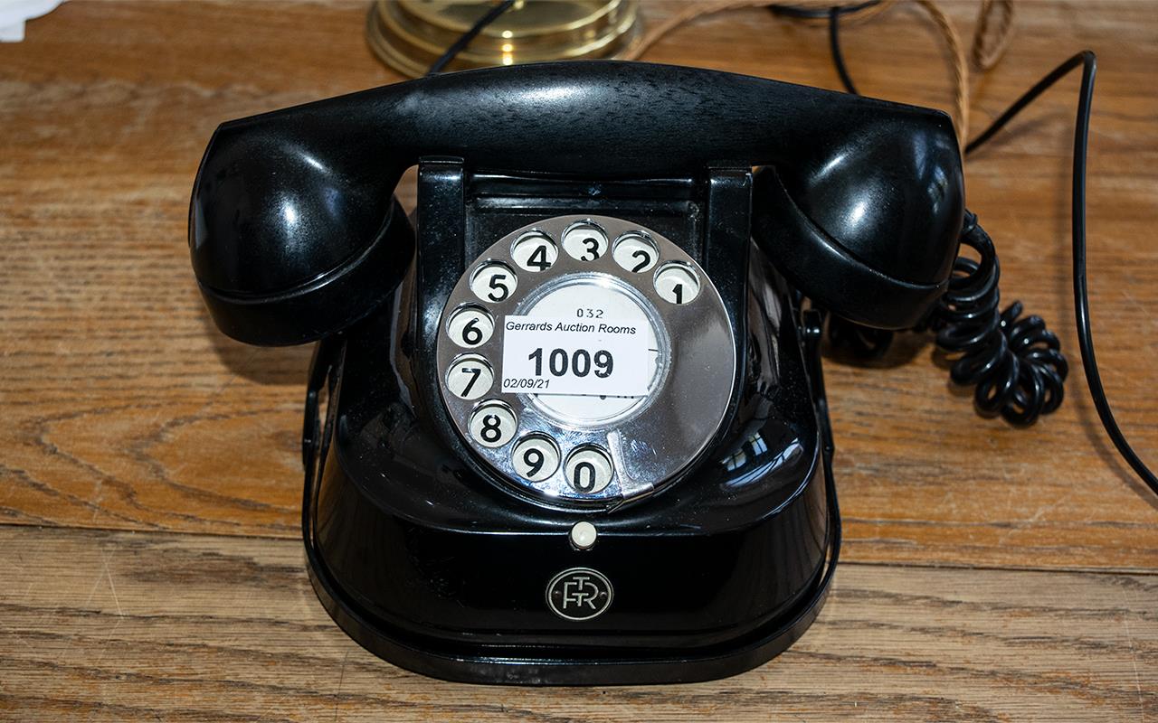 A Retro Black Enamel Continental Telephone, in working order, by R.T.T.