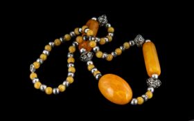 African Vintage Large Statement Necklace, amber plastic with white metal spacers, the three amber