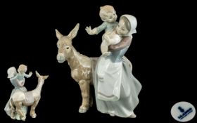 Lladro - Hand Painted Porcelain Figure ' Donkey Ride ' Model No 4843. Issued 1973 - 1981. Height 9.