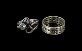 Two Kit Heath Design Sterling Silver Rings, one set with stones, size M, and the other a wide band