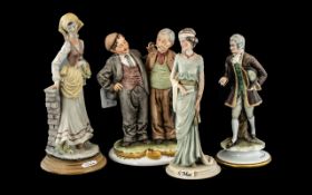 Collection of Four Capodimonte Figures, comprising a pair of tramps, an elegant lady,