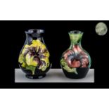 Moorcroft - Pair of Small Tubelined Vases ' Hibiscus Variations' Design.