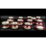 Tea Service by Chodziez, made in Poland, comprising ten cups, twelve saucers,