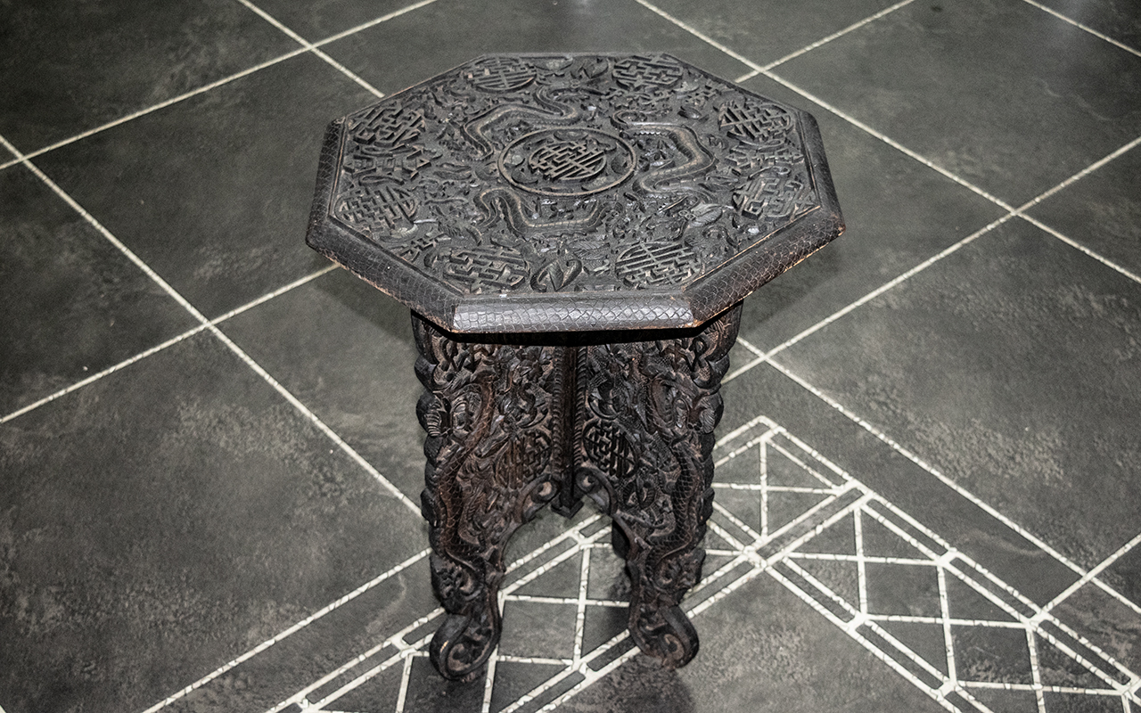 Small Carved Wooden Oriental Table, fold up, 17" tall x 15" table top diameter.