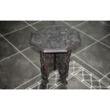 Small Carved Wooden Oriental Table, fold up, 17" tall x 15" table top diameter.