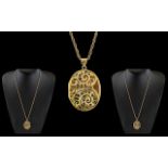 Ladies - Excellent Quality 9ct Gold Oval Shaped Hinged Locket with Chased Decoration to Front Cover,