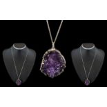 A Vintage and Attractive Sterling Silver Amethyst Quartz Set Pendant and Chain.