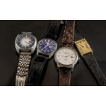 Four Vintage Wristwatches comprising two Seiko, 21 an 17 jewels, a large dial Rhythm auto.