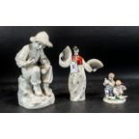 A Small Collection of Pottery to include a large Russian Porcelain figure of a seated boy 33 cms in