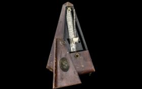 A German Metronome of Typical Form. 9" tall.