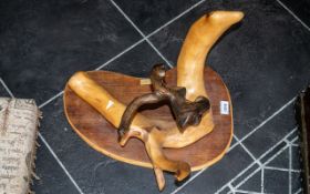 A Modern Abstract Wood Root Decorated Wall Plaque, titled 'Alien' by Norman Nicholson. 20'' wide x