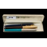 Collection of Parker Fountain Pens, comprising a dark blue Parker with a 14k nib,