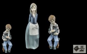 Nao by Lladro Pair of Hand Painted Porcelain Figures. Tallest Figure 9.5 Inches - 23.75 cms.