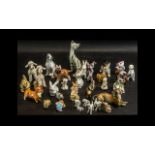 A Collection of Decorative Animal Figures Includes 17 x Various China / Porcelain Dogs, 1 x Cat,