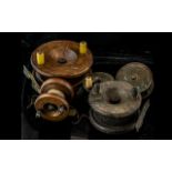 Five Vintage Fishing Reels comprising three various sizes of wooden reel,