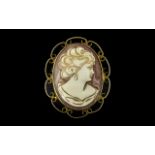 A 9ct Gold - Open Worked Mounted Shell Cameo / Brooch, With Central Carved Image of a Young Woman.