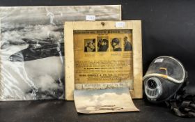 WWII Period 'Puretha Respirator Mark lV' Poster with a Panorama MCUA face mask and two photos of a