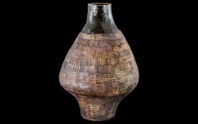 Large Art Studio Pottery Vase of bulbous shape, with an African weave design, 14 inches (35cms)