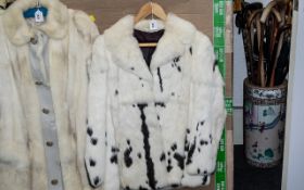 Ladies White & Black Mink Jacket, collar and reveres, two slit pockets, hook and eye fastening,