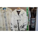 Ladies White & Black Mink Jacket, collar and reveres, two slit pockets, hook and eye fastening,