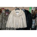 Ladies Mink Jacket, hip length, two slit pockets, collar and reveres, scalloped hem.