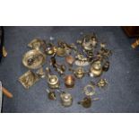 Large Quantity of Brass & Copper Items, comprising assorted tea pots, wall plaques, milk urns, pots,