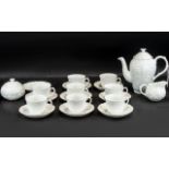 Coalport Countryware White Tea Service, comprising a tea pot, lidded sugar bowl, milk jug,