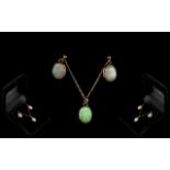A 9ct Gold Mounted Opal Pendant and Earring Set plain rub over setting with matching plain drop