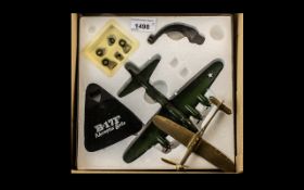 Model of Memphis Belle B-17F, new in box, together with a brass model plane desk ornament.