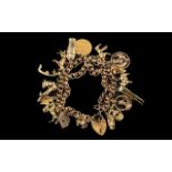 Ladies 9ct Gold - Rolla Ball Charm Bracelet - Loaded with ( 19 ) Excellent 9ct Gold Charms + A 22ct