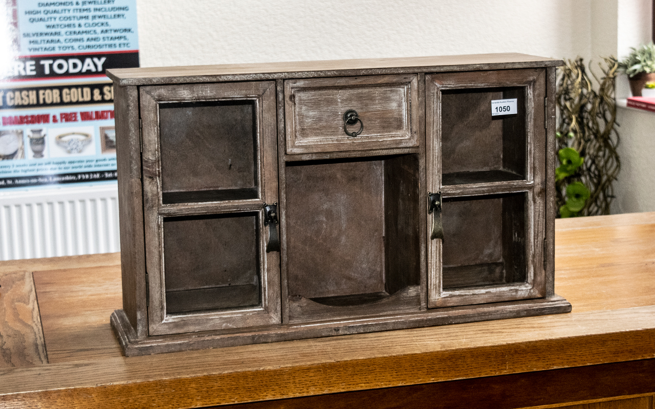 Small Wooden Display Cabinet with two cupboard doors with glass fronts,