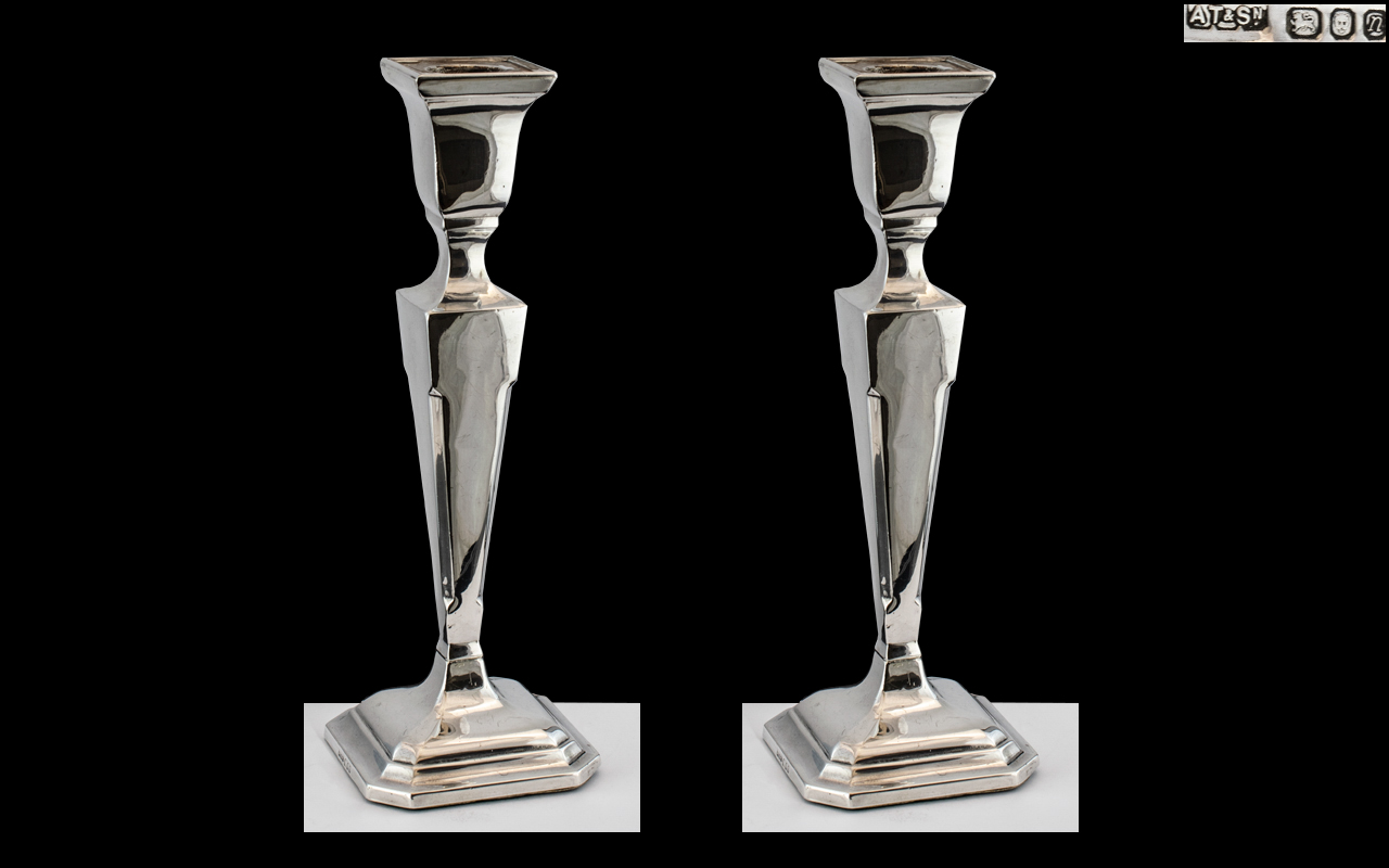 Elizabeth II Pair of Sterling Silver Candlesticks of Pleasing Proportions.