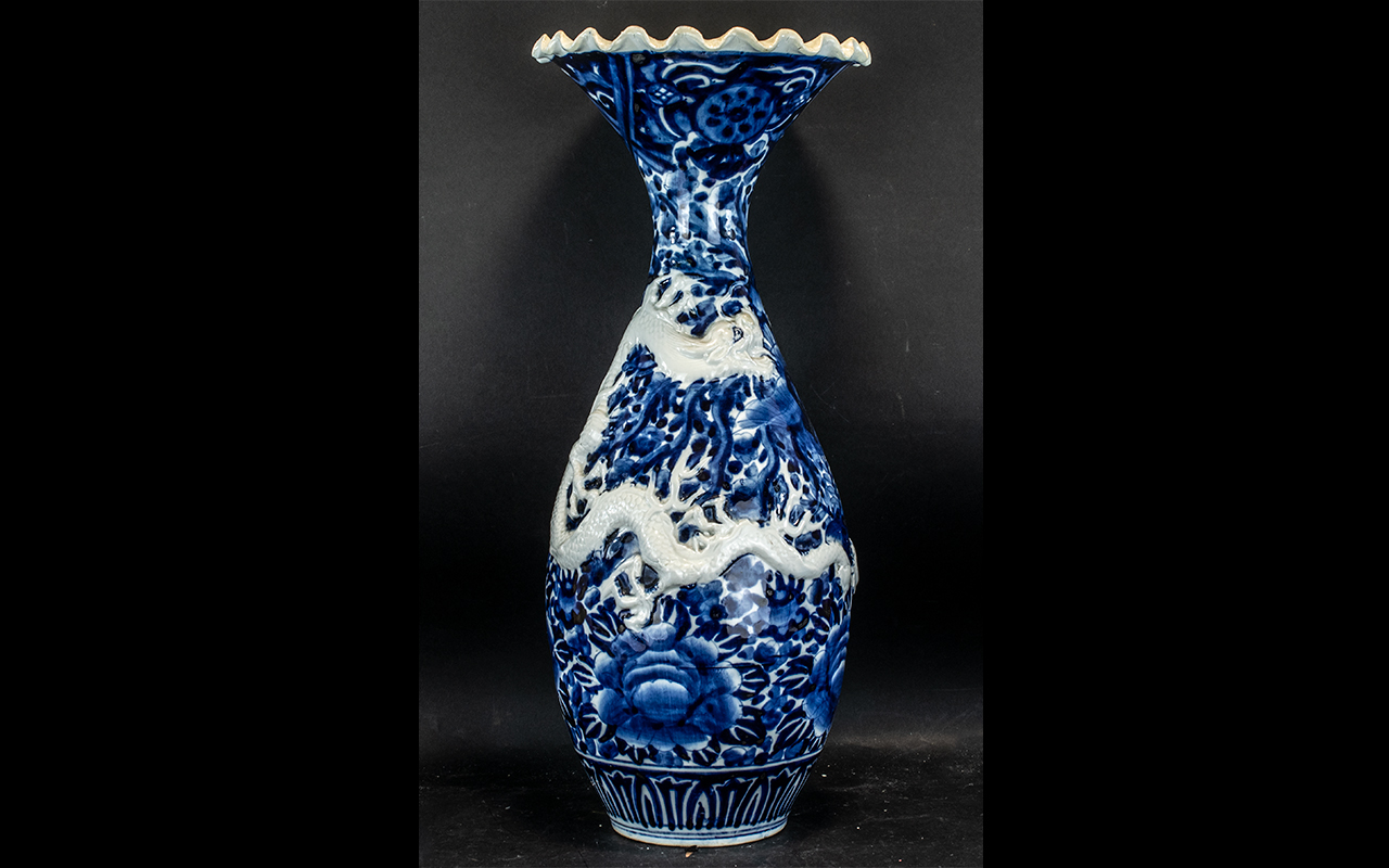 Large Japanese Meiji Period Blue and White Decorated Fishtail Shape Vase with a raised, moulded,