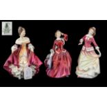 Royal Doulton Trio of Handpainted Porcelain Figures, comprising: 1.