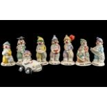 Collection of Small Beswick Clown Figures, comprising LL7 Clown in car, LL4 'Just for You',