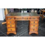 A Modern Twin Pedestal Desk, two banks of three drawers, and three frieze drawers,