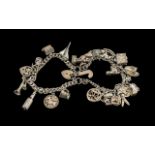 Vintage Sterling Silver Charm Bracelets - Loaded with Over 26 Silver Charms.
