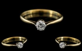 18ct Gold and Platinum Single Stone Diamond Set Ring, Marks Rubbed but Tests 18ct Gold. The Round