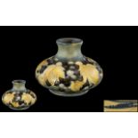 William Moorcroft Signed Small Salt Glaze Squat Vase ' Leaves and Blue Berries ' Design. c.1930's.