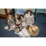 Collection of Seven Dolls dressed in Victorian fashions with stands, together with five straw hats