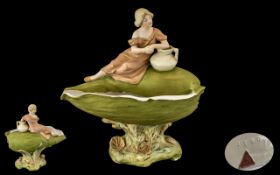 Royal Dux Handpainted Figure Group featuring a young female holding a water jug,