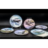 A Collection of Six Commemorative Wall Plates Depicting Wartime Aircraft,