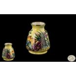 Moorcroft Small Enamelled Cabinet Vase, hand painted to the body with Autumn forest fruits,