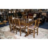 Reproduction Oak Cottage Dining Room Suite comprising a traditional draw-leaf table supported on