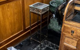 Modern Metal and Glass Table, 31" tall with a 10" square glass top,