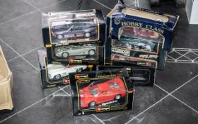 A Collection of Boxed Die Cast Model Cars, to include Hobbycraft Convertible, Maisto Jaguar XS220,