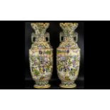 Pair of Large Satsuma Type Vases, with shaped petal top and elephant side handles. The body