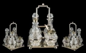 Victorian Silver Plated Cruet Stand with four glass condiments, of square form,